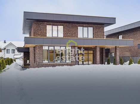 Купить загородный дом в духе архитектуры Фрэнка Ллойда Райта в КП Русская деревня. ID 22819