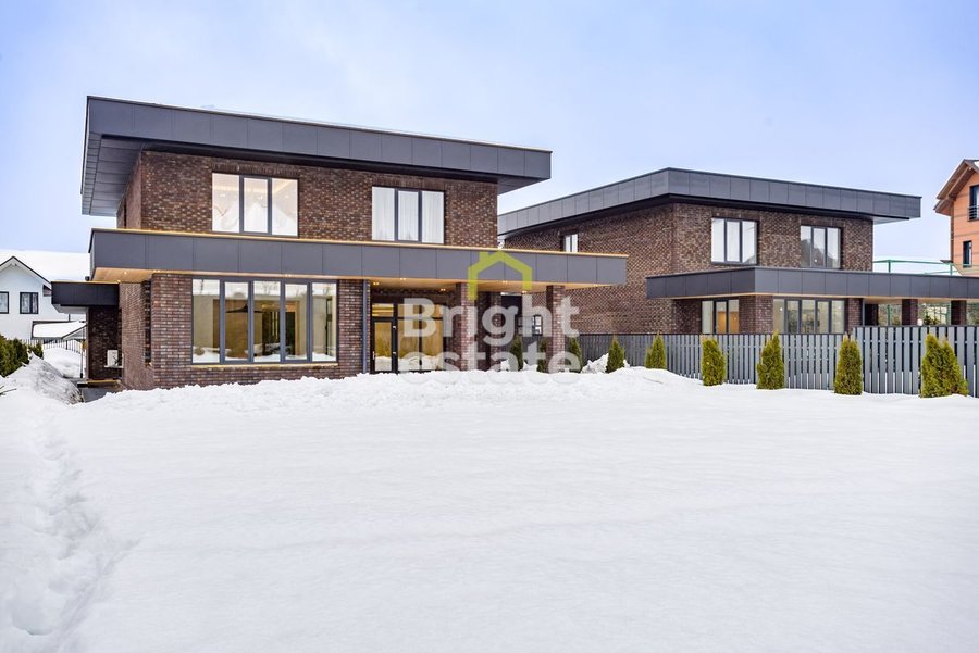 Купить загородный дом в духе архитектуры Фрэнка Ллойда Райта в КП Русская деревня. ID 22819