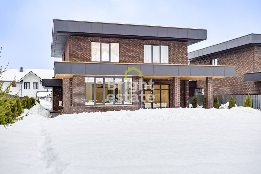 Купить загородный дом в духе архитектуры Фрэнка Ллойда Райта в КП Русская деревня. ID 22819